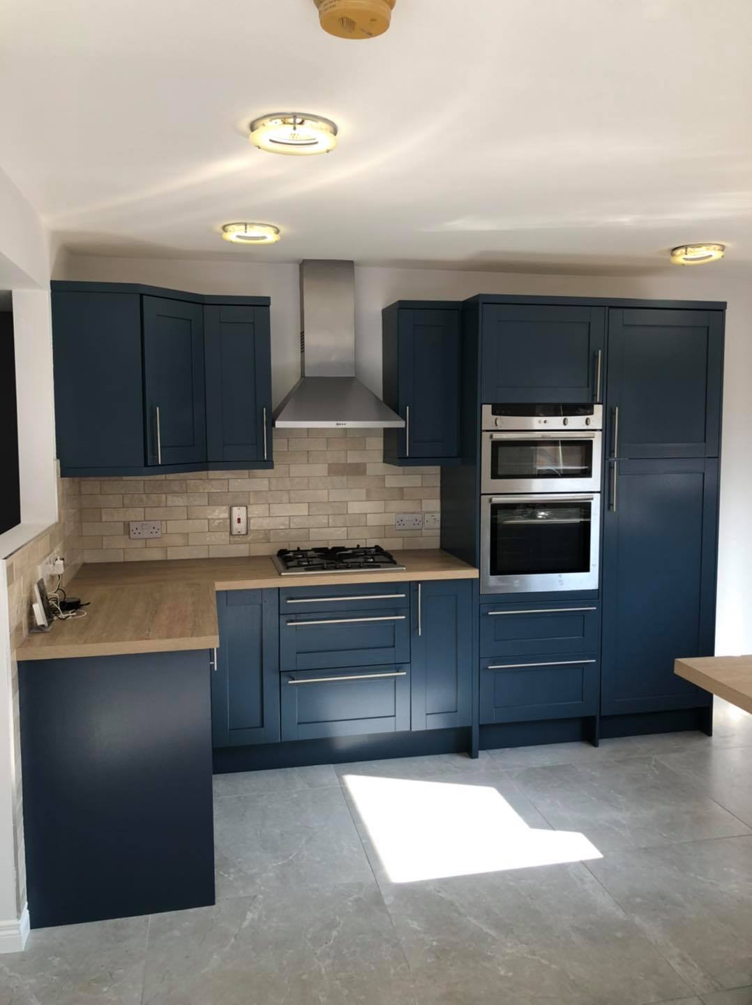 Navy painted kitchen with cooker