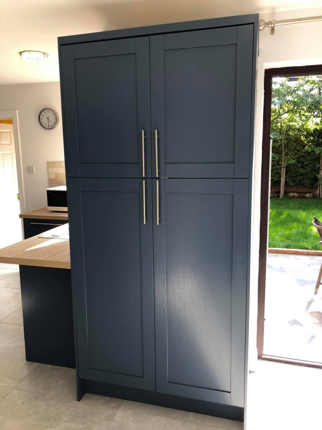 Navy painted tall cabinet