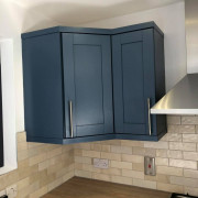 Navy painted corner cabinet