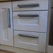 White Vinyl Wrapped Laminated Kitchen